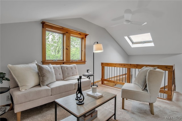 9466 Ridge Rd, Hartland, NY 14105 - living room with vaulted ceiling, a skylight, a ceiling fan, and carpet flooring