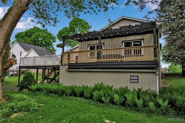 9466 Ridge Rd, Hartland, NY 14105 - rear view of house featuring stairway and a deck