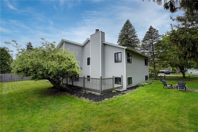view of side of property with a chimney