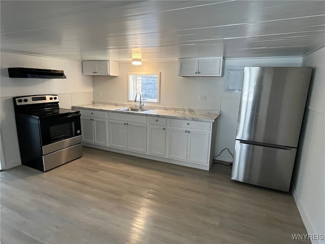 1597 Franklin St, Newfane, NY 14126 - kitchen with appliances with stainless steel finishes, under cabinet range hood, a sink, and light wood finished floors