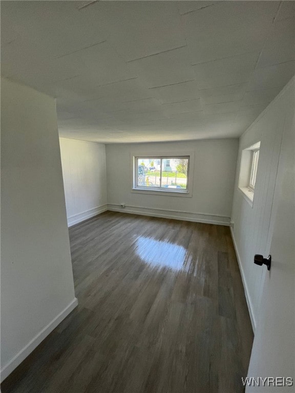 1597 Franklin St, Newfane, NY 14126 - unfurnished room with dark wood-style flooring and baseboards
