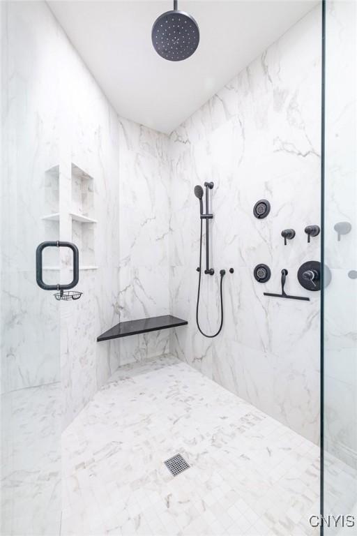4490 Lauder Ln, Skaneateles, NY 13152 - full bath featuring a marble finish shower