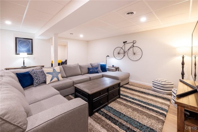 4490 Lauder Ln, Skaneateles, NY 13152 - living area with a paneled ceiling, recessed lighting, and wood finished floors