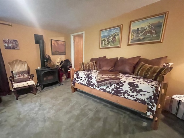 920 New Kingston Rd, Middletown, NY 12455 - bedroom featuring a wood stove and carpet flooring