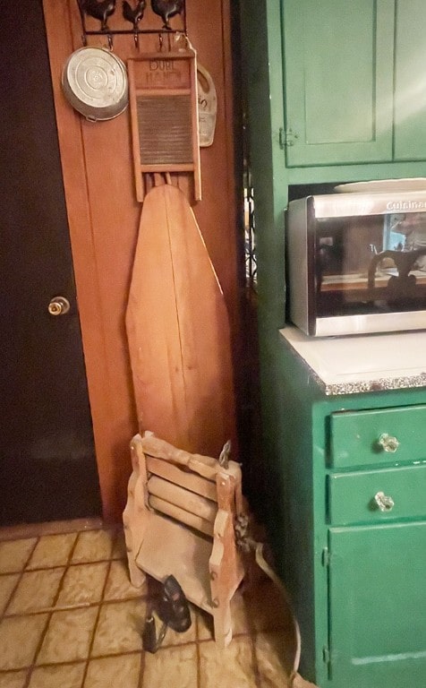 920 New Kingston Rd, Middletown, NY 12455 - kitchen view of green cabinets and stainless steel microwave
