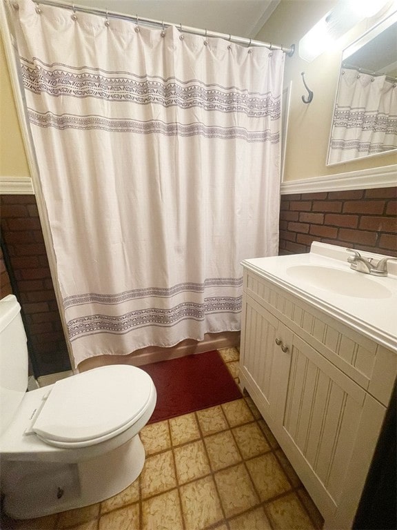 920 New Kingston Rd, Middletown, NY 12455 - bathroom featuring toilet, vanity, a wainscoted wall, and a shower with curtain