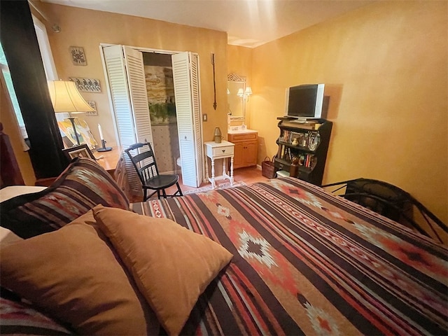 920 New Kingston Rd, Middletown, NY 12455 - bedroom featuring a closet and wood finished floors