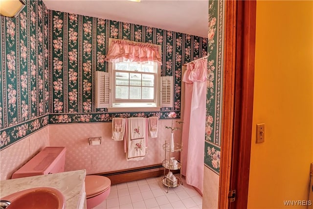 1604 Stardust Ln, Olean-City, NY 14760 - full bath featuring toilet, tile patterned floors, wallpapered walls, a baseboard radiator, and vanity