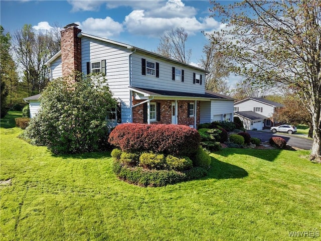 1604 Stardust Ln, Olean-City, NY 14760 - view of front of home featuring a chimney and a front lawn