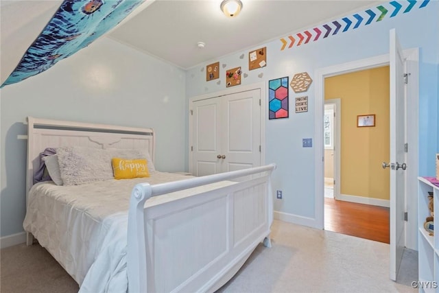 3543 Lost Hollow Rd, Skaneateles, NY 13152 - bedroom with baseboards, a closet, and light carpet