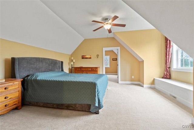 3543 Lost Hollow Rd, Skaneateles, NY 13152 - bedroom with light colored carpet, vaulted ceiling, ceiling fan, and baseboards