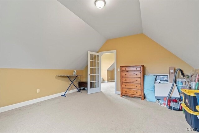 3543 Lost Hollow Rd, Skaneateles, NY 13152 - recreation room with carpet floors, vaulted ceiling, and baseboards