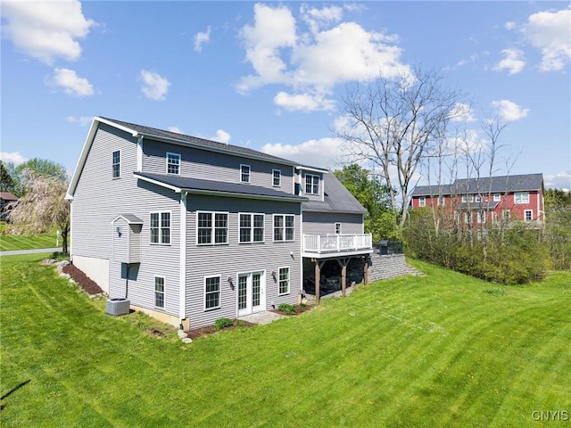 3543 Lost Hollow Rd, Skaneateles, NY 13152 - back of house with french doors, a lawn, a wooden deck, and cooling unit
