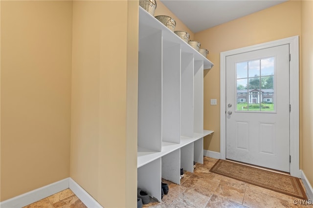 3543 Lost Hollow Rd, Skaneateles, NY 13152 - mudroom featuring stone finish floors and baseboards