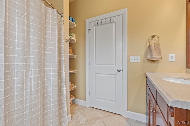 3543 Lost Hollow Rd, Skaneateles, NY 13152 - bathroom featuring vanity, baseboards, tile patterned flooring, and curtained shower