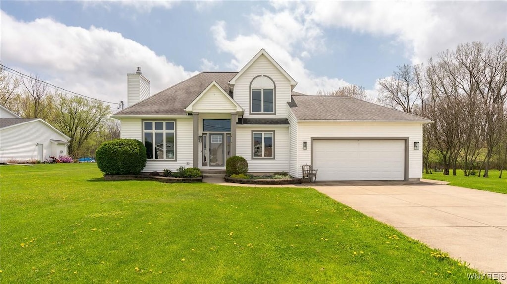 6235 Powers Rd, Orchard Park, NY 14127 - traditional home with a garage, driveway, a front lawn, and a chimney