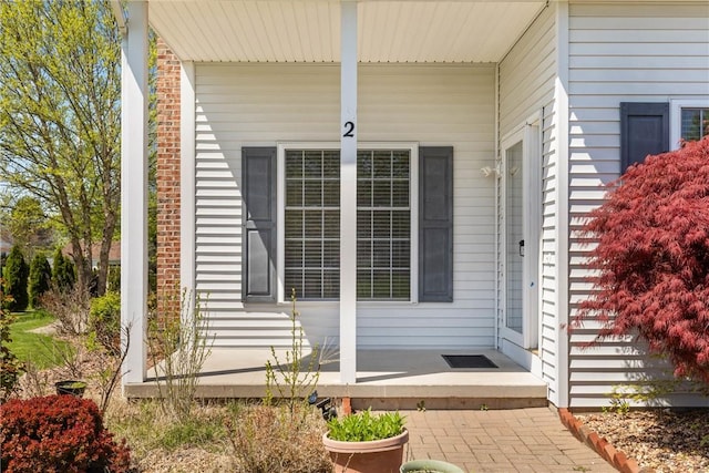 property entrance with a porch