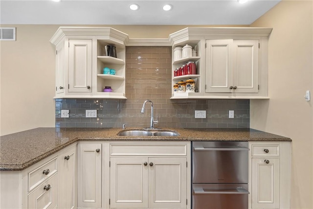 kitchen with open shelves, a sink, tasteful backsplash, and recessed lighting