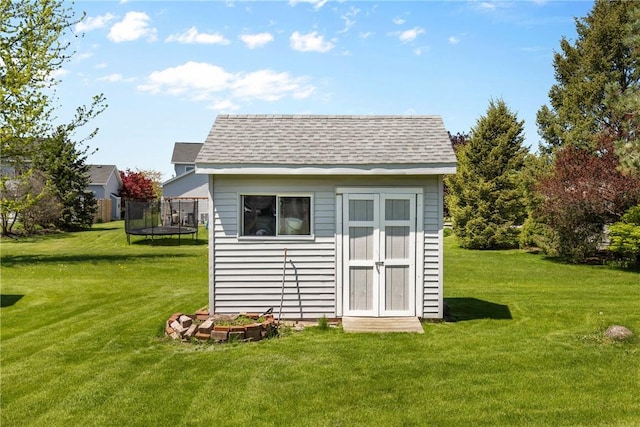 view of shed with a trampoline