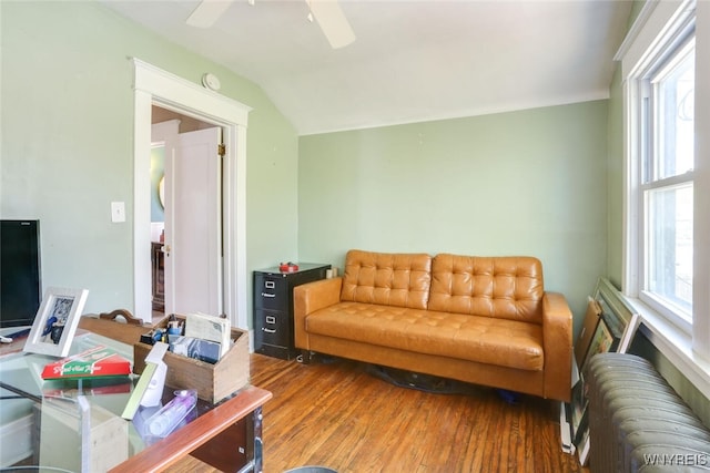 82 Radcliffe Rd, Buffalo, NY 14214 - living area with radiator heating unit, lofted ceiling, a ceiling fan, and wood finished floors