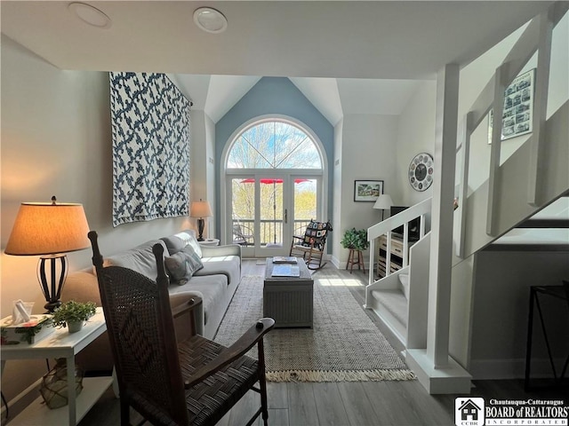 1 Pratt Ave Unit 407, Chautauqua, NY 14722 - living area with wood finished floors, stairway, and baseboards