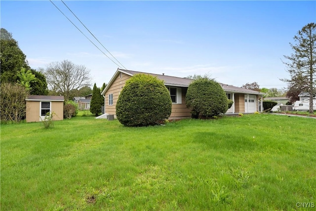 7565 Audrey Dr, Clay, NY 13212 - view of front of home with a front yard