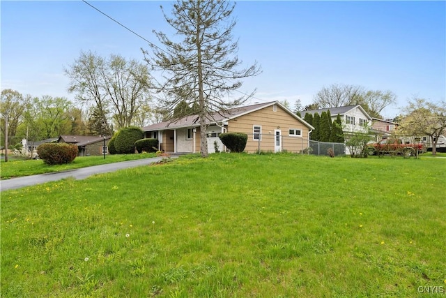7565 Audrey Dr, Clay, NY 13212 - single story home with asphalt driveway