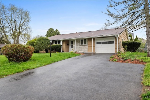 7565 Audrey Dr, Clay, NY 13212 - single story home featuring an attached garage, driveway, and a front yard