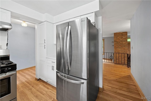 7565 Audrey Dr, Clay, NY 13212 - kitchen featuring stainless steel appliances, range hood, white cabinetry, light wood-style flooring, and baseboards