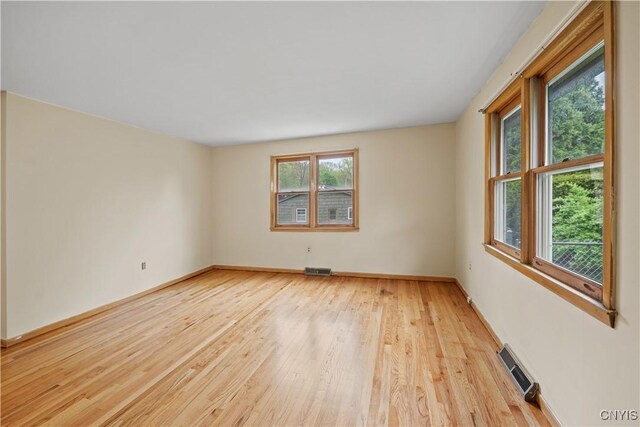 7565 Audrey Dr, Clay, NY 13212 - unfurnished room with light wood-style floors and baseboards
