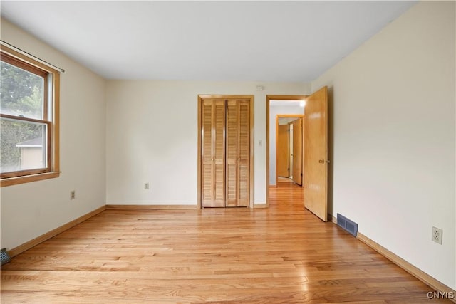 7565 Audrey Dr, Clay, NY 13212 - unfurnished room with light wood finished floors and baseboards