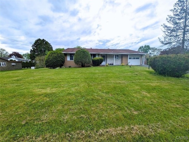 7565 Audrey Dr, Clay, NY 13212 - view of front of property with a garage and a front lawn
