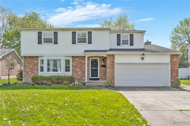 view of front of home with brick siding, a front yard, and driveway
