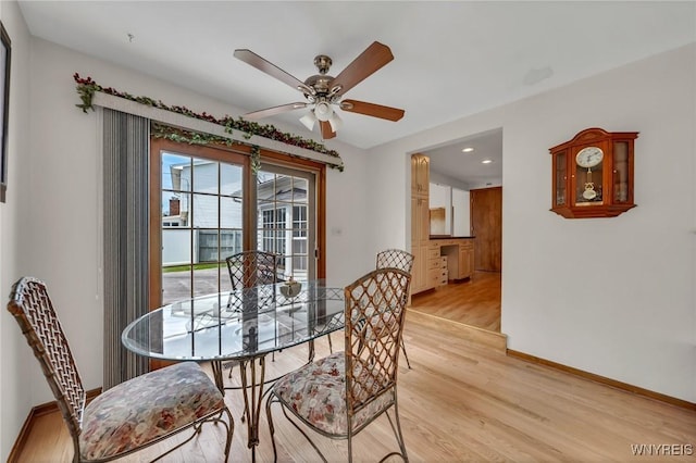 dining area with a ceiling fan, light wood finished floors, baseboards, and recessed lighting