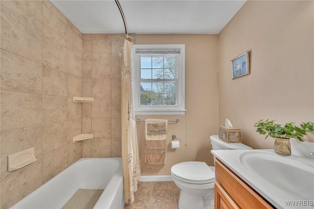 bathroom featuring toilet, tile patterned flooring, vanity, baseboards, and shower / bath combination with curtain