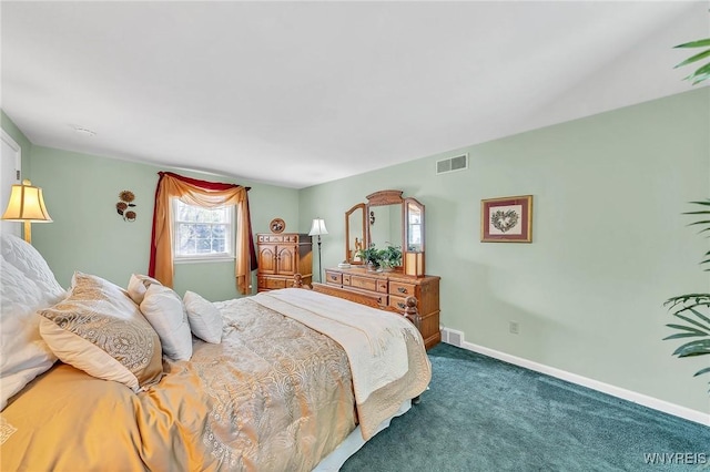 bedroom featuring carpet floors and baseboards