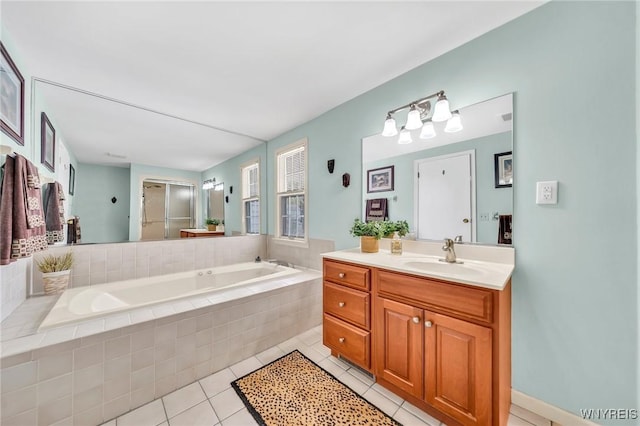 bathroom featuring a bath, tile patterned floors, vanity, and a shower with door