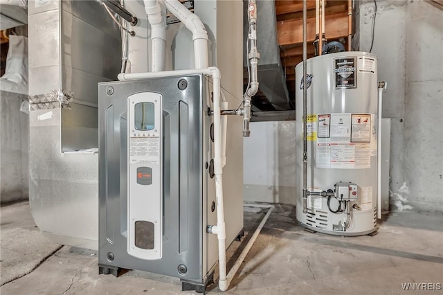 utility room featuring water heater