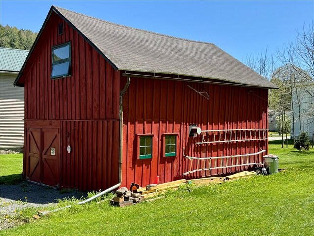 2395 State Highway 205, Laurens, NY 13810 - view of barn featuring a lawn