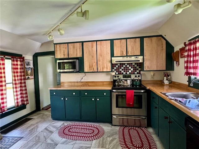 2395 State Highway 205, Laurens, NY 13810 - kitchen featuring stainless steel appliances, under cabinet range hood, a sink, vaulted ceiling, and track lighting