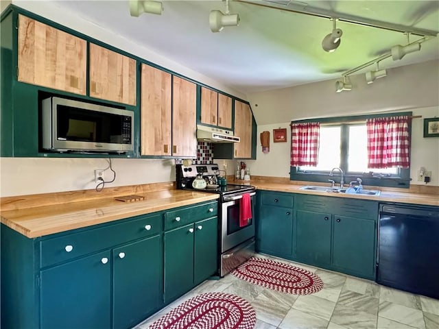 2395 State Highway 205, Laurens, NY 13810 - kitchen with stainless steel appliances, a sink, under cabinet range hood, rail lighting, and butcher block counters