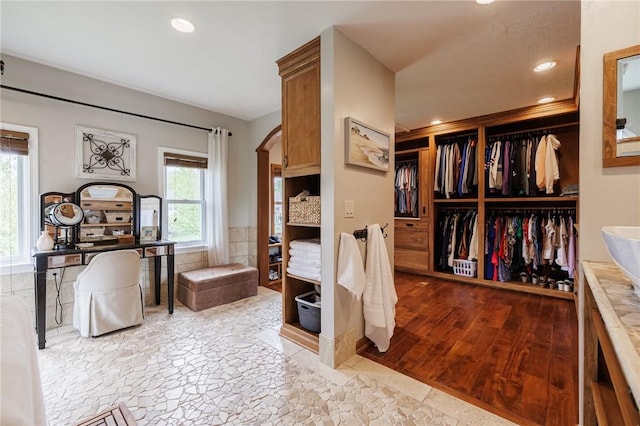 bathroom featuring recessed lighting and stone finish flooring
