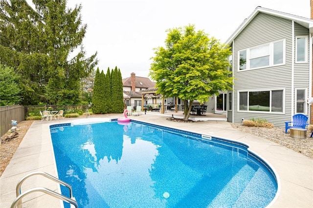 view of pool featuring a fenced backyard and a patio area