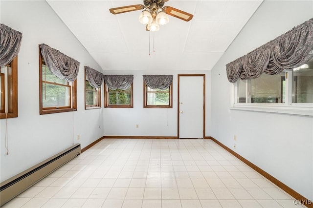 empty room featuring a baseboard radiator, lofted ceiling, a ceiling fan, and baseboards