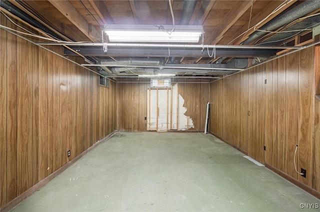 unfinished below grade area with wood walls