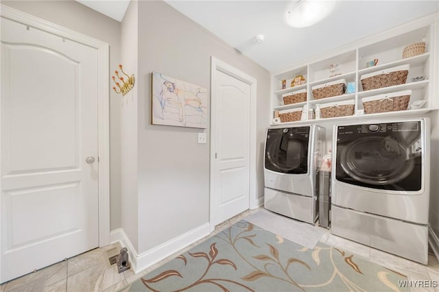6811 Rivera Way, Clarence, NY 14051 - clothes washing area featuring independent washer and dryer and baseboards