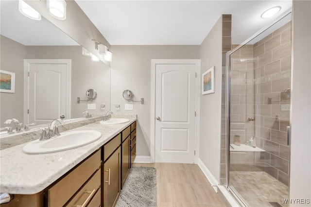 6811 Rivera Way, Clarence, NY 14051 - full bath with a stall shower, double vanity, and baseboards