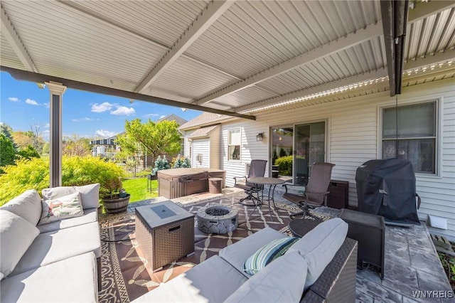 6811 Rivera Way, Clarence, NY 14051 - view of patio featuring a hot tub, an outdoor living space with a fire pit, and grilling area