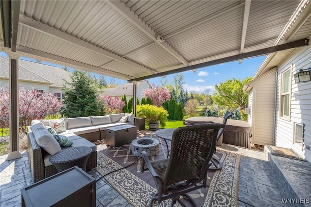 6811 Rivera Way, Clarence, NY 14051 - view of patio / terrace with an outdoor living space with a fire pit and a hot tub