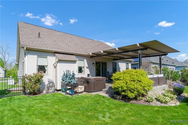 6811 Rivera Way, Clarence, NY 14051 - back of house with a hot tub and roof with shingles